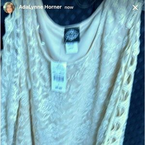 Never been worn and too small in the bust for me.